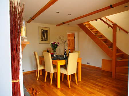 Open Plan Living Room with Wooden Staircase